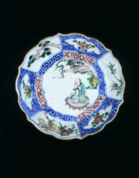 Pair of wucai saucers with luohan on rush matLate