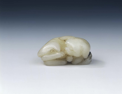White jade lap dog with bell and ribbonSouthern