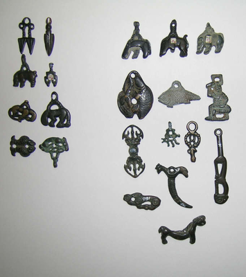 Two groups of amuletic pendants with suspension