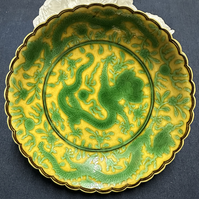 Green and imperial yellow dragon saucer
Qing