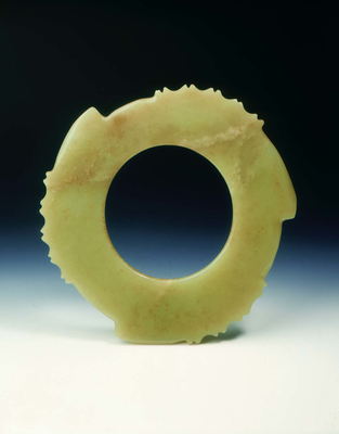 Jade bi-disc with notches and teethNeolithic