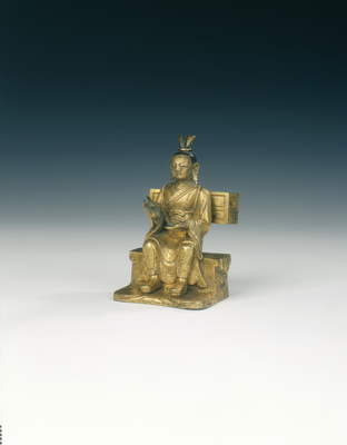 Gilt bronze itinerant monk with sutra caseTibet