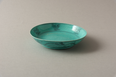 Turquoise and aubergine glazed saucer with