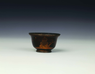Black lacquer cup with gold painted landscape