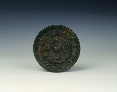Bronze lion and grapevine mirror
Tang dynasty