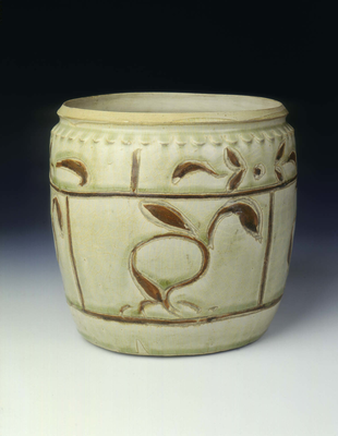 Celadon jar with floral decoration in brown slip