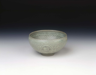 Celadon bowl with inlaid design of storks amid