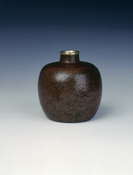 Globular stoneware jar with red oil spot