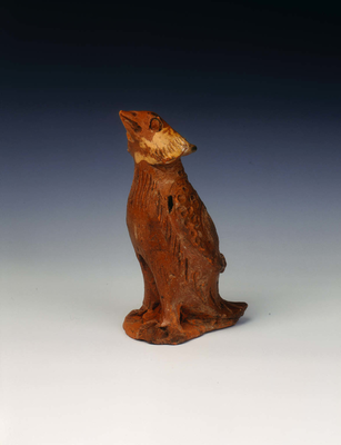 Brown lead glazed modelled bird of preyEastern
