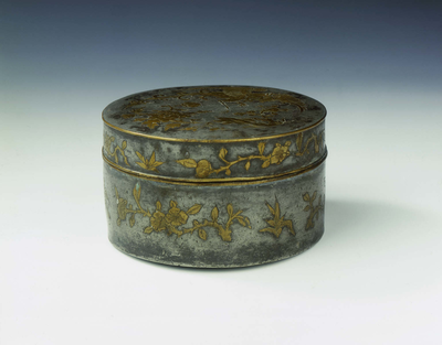 Parcel gilt pewter covered box with phoenix and