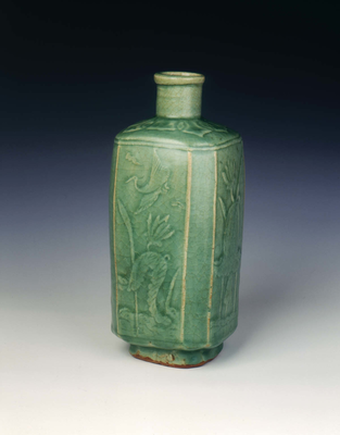 Squared celadon glazed bottle with carved birds