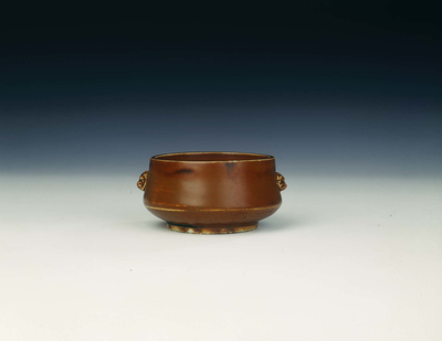 Dehua incense burner with rust-red glaze
Early