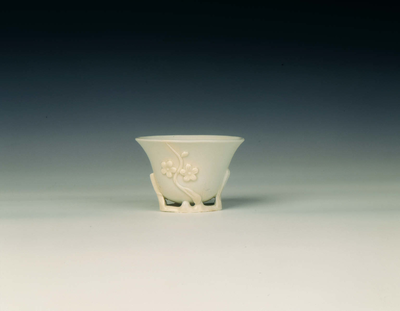 Dehua porcelain cup with prunus in reliefQing