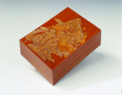 Bamboo covered box decorated with landscape scene