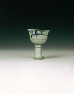 Blue and white stem cup with bird on branch
Ming