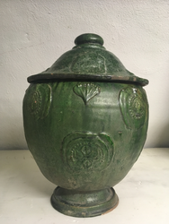 Green lead glazed urn and cover with applied