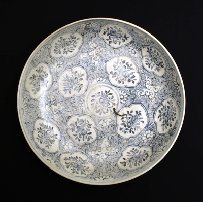 Blue and white plate with ogival medallions on a