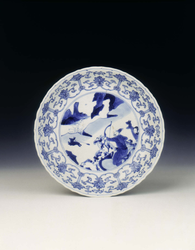 Blue and white dish with archers on