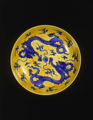 Yellow plate with blue dragonsQing dynasty