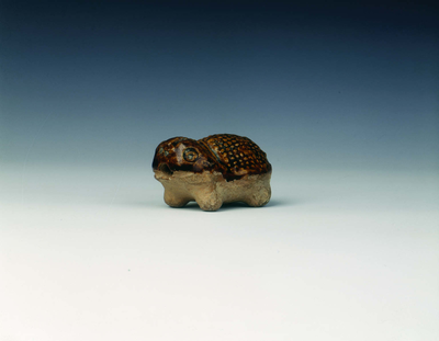 Brown pottery toad-like animal
Tang dynasty