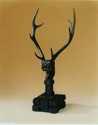 Wooden black lacquer guardian figure with antlers