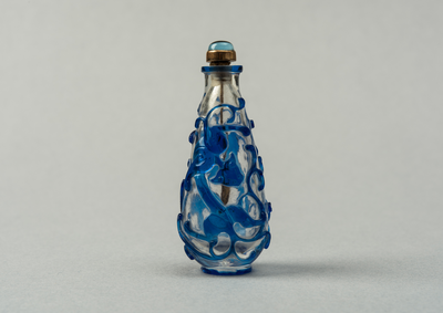 Glass snuff bottle, clear with dark blue overlay