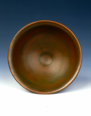 Yaozhou stoneware tea bowl with persimmon red