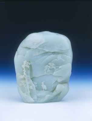 Celadon green jade mountain with scholar and