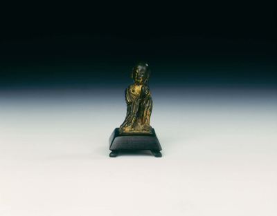 Gilt bronze figure of a praying Buddhist
