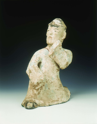 Painted pottery male dancing figureEarly