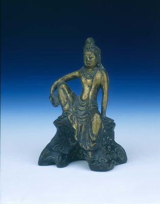 Gilt bronze figure of a deified lama seated in